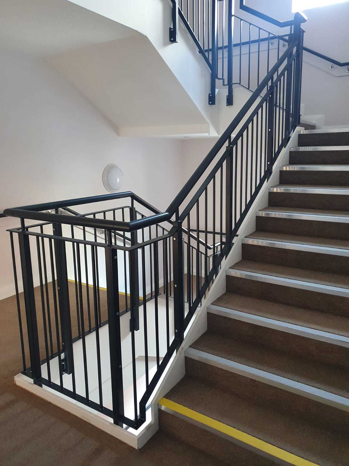 Mild Steel Vertical Bar Stair Balustrade with a Circular Handrail